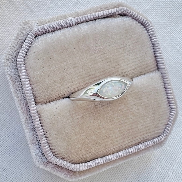 Marquise Inset Breastmilk Ring with handmade opalescent breastmilk stone set into a polished silver band.