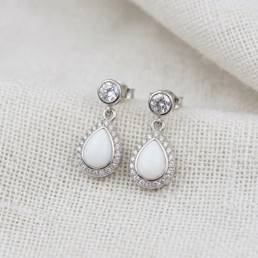 Silver teardrop drop earrings with cz halo. Made from breastmilk