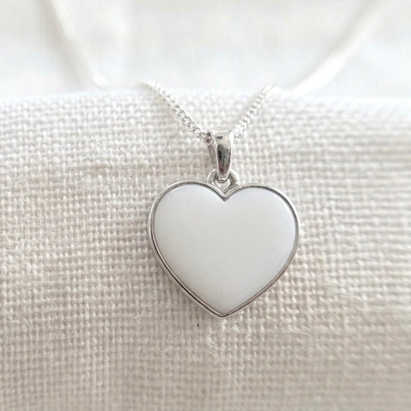 Sterling silver Classic Heart Breastmilk Pendant handmade with preserved breastmilk by MamaGems by Memory Within.