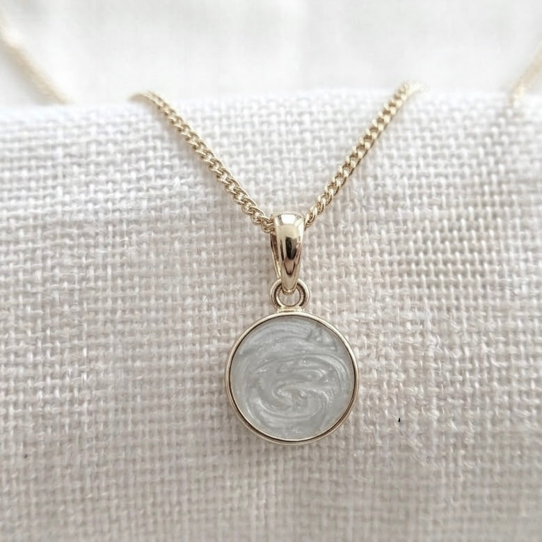 Round sterling silver breastmilk pendant