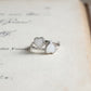 Twin Heart sterling silver breastmilk ring with two handcrafted heart-shaped breastmilk stones by MamaGems.